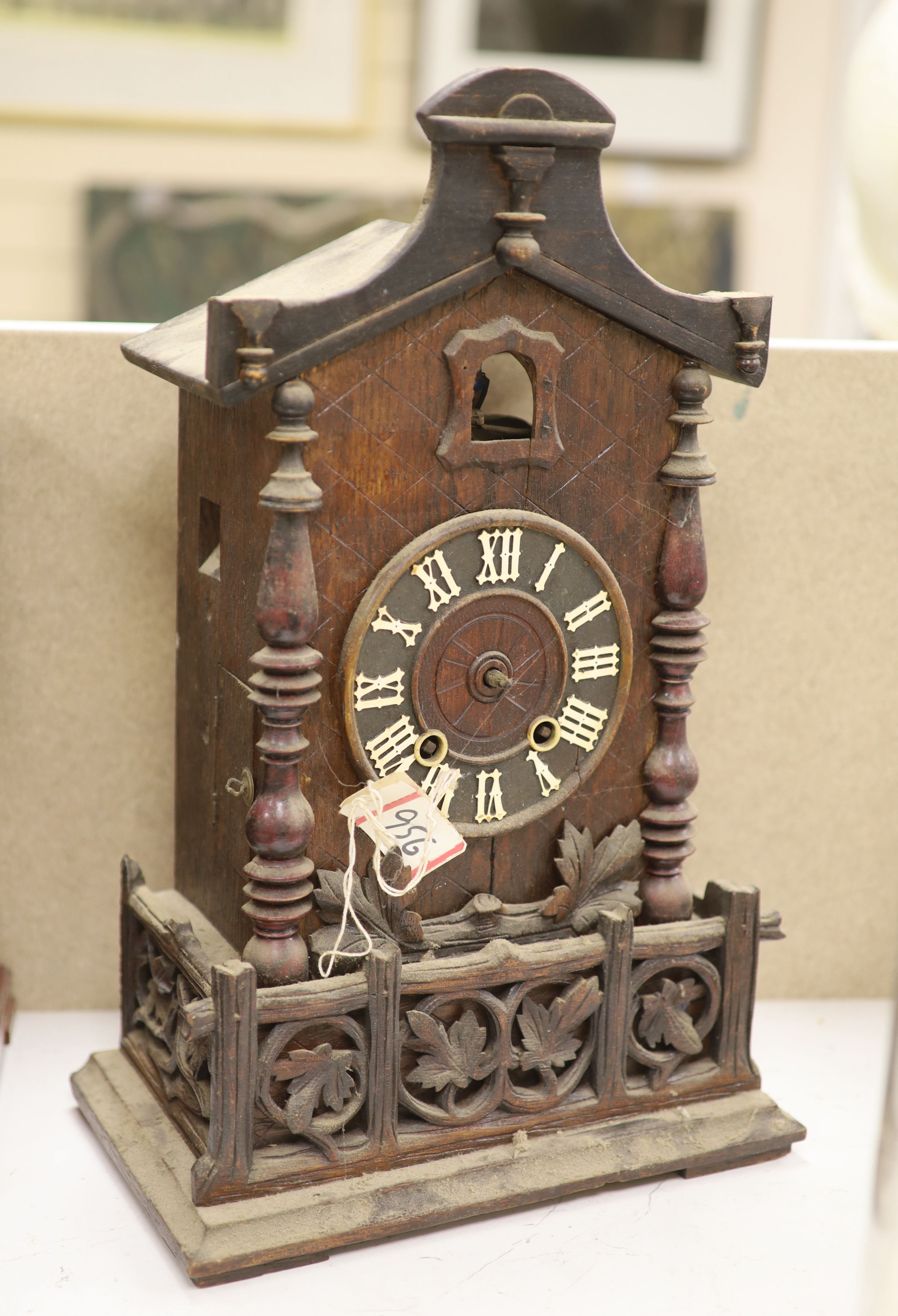 A late 19th century Black Forest cuckoo mantel clock, height 45cm